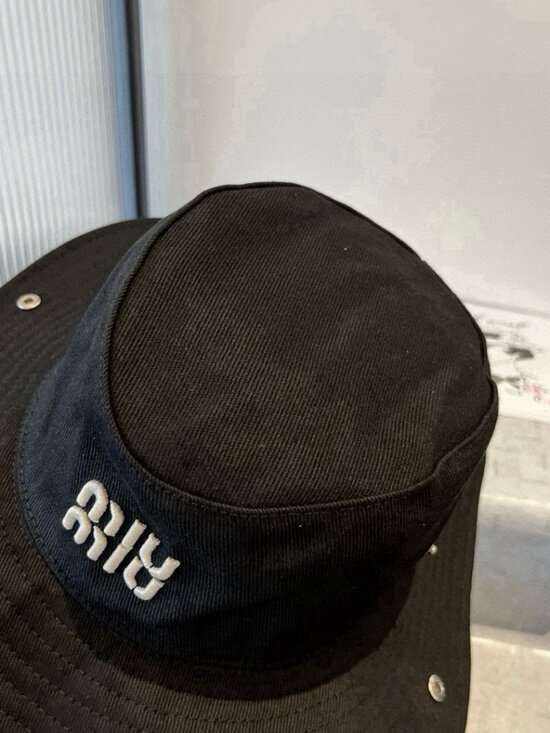 Miu Miu Black Wide Brim Bucket Hat White Raised Embroidery Logo Side Snap Detail